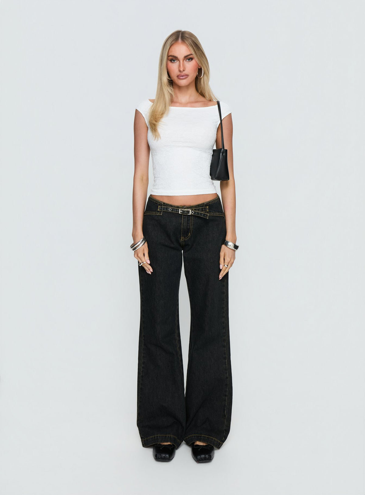 front view of model wearing Princess Polly Slow Ride Mid Rise Bootleg Belted Jeans Grunge Wash Mid Rise Jeans Jeans 