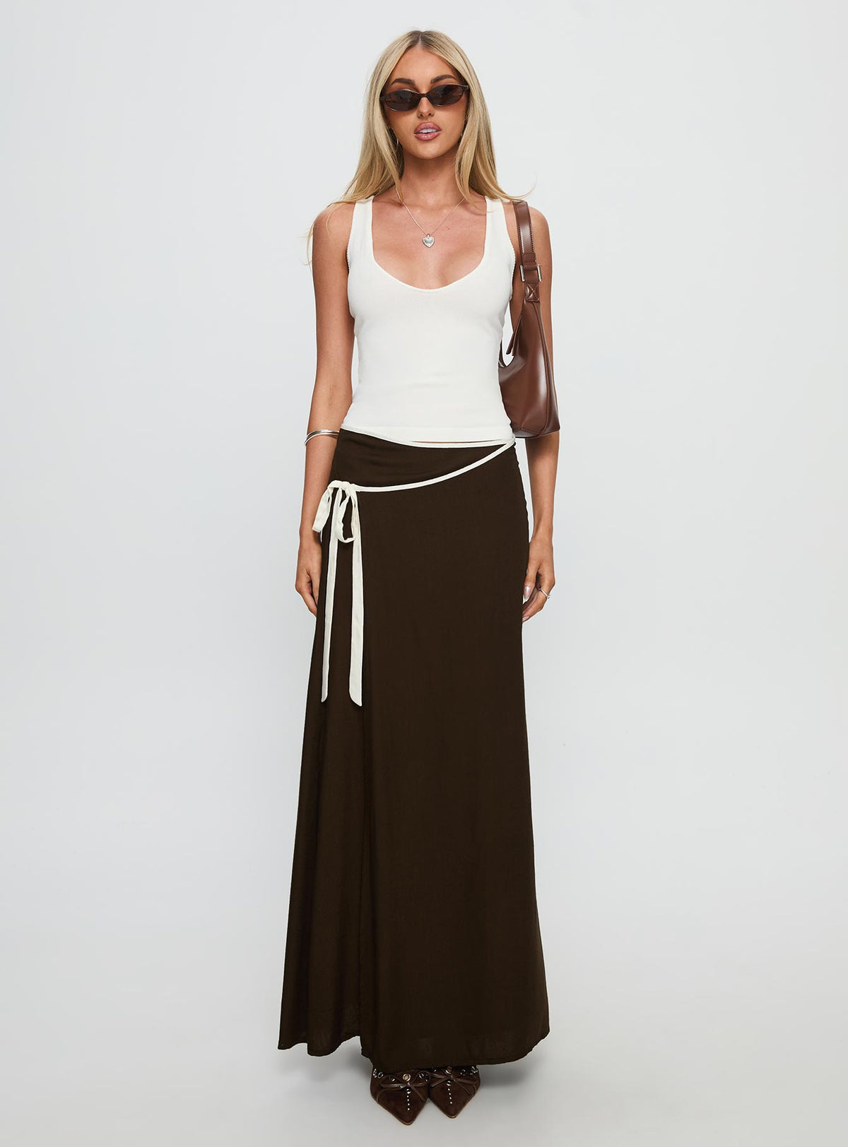   side view of model wearing Princess Polly Keirah Contrast Wrap Maxi Skirt Chocolate / White Maxi Skirts Skirts 