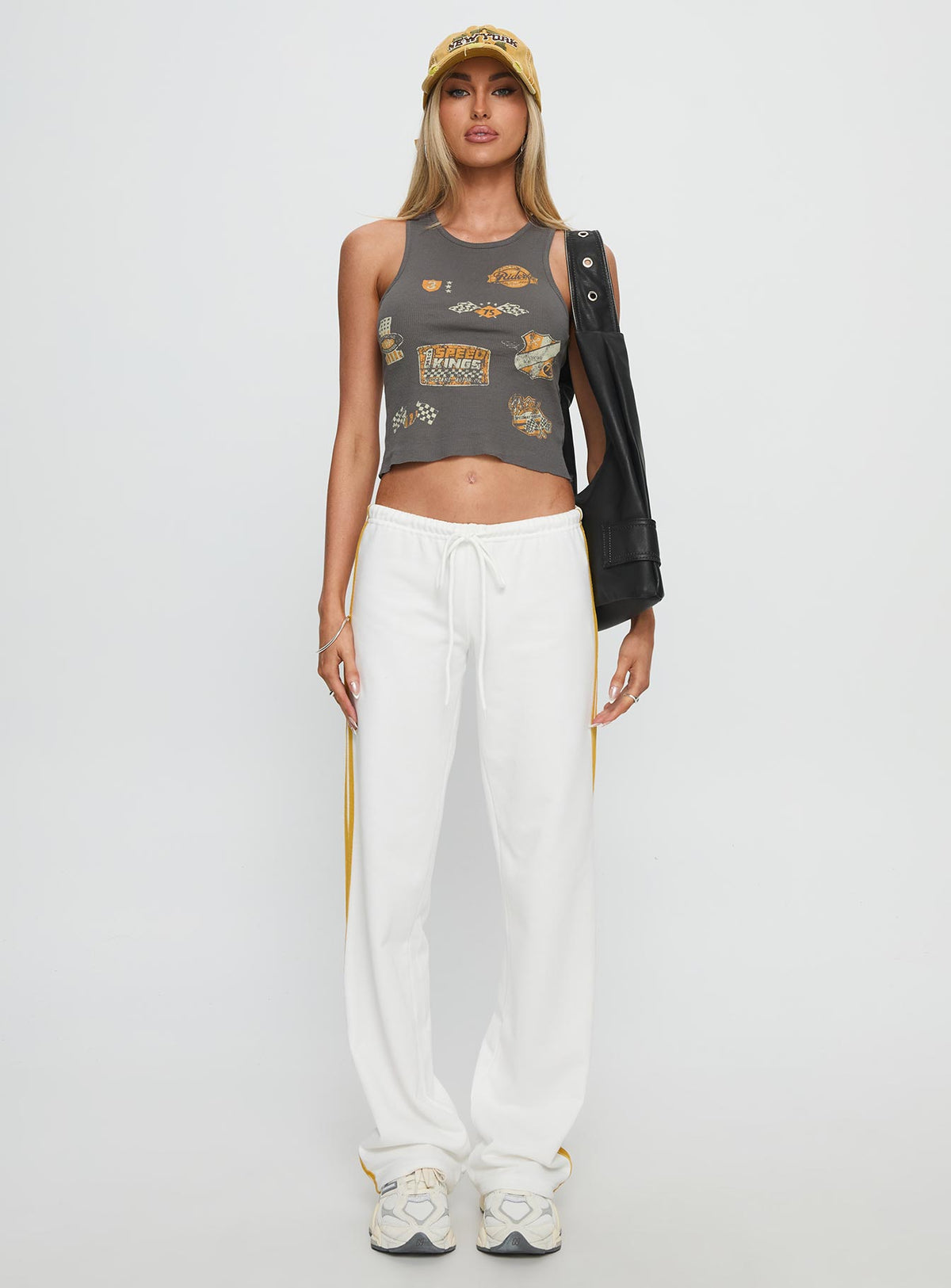 front view of model wearing Princess Polly Elation Low Rise Straight Leg Track Pant White Low Rise Pants Pants 