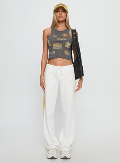 front view of model wearing Princess Polly Elation Low Rise Straight Leg Track Pant White Low Rise Pants Pants 