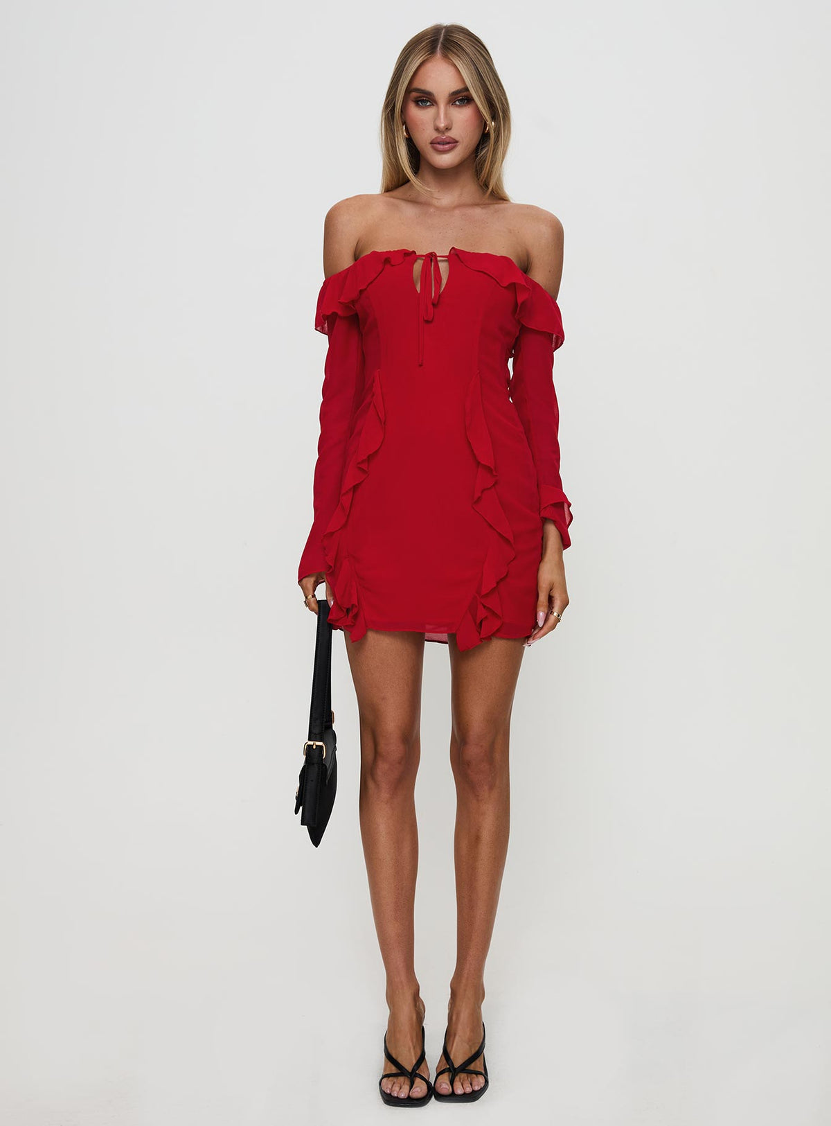 side view of model wearing Princess Polly Mollins Long Sleeve Mini Dress Red Straight Neck 