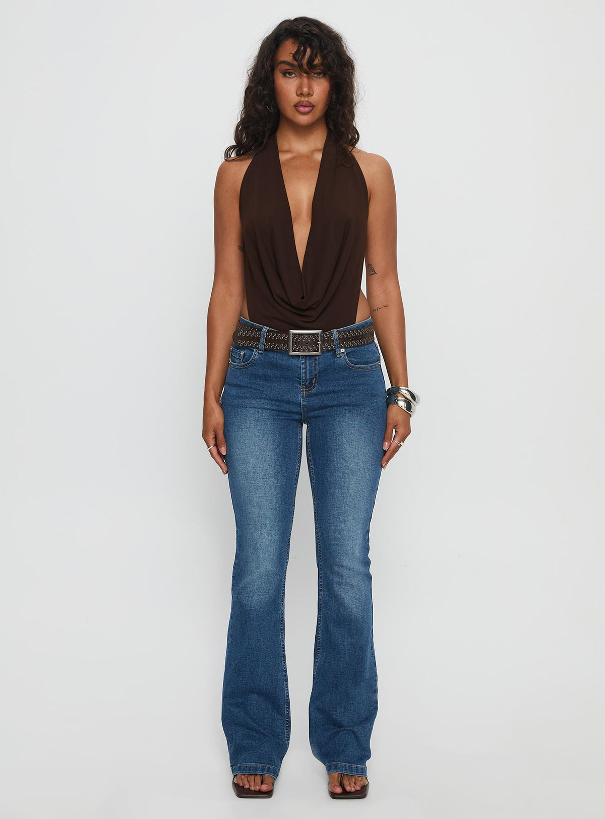 front view of model wearing Princess Polly Quinna Plunge Neck Backless Bodysuit Chocolate Sleeveless Bodysuit 
