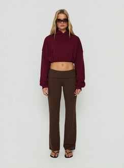 Discover the Mayse Bubble Hem Cropped Hoodie Cherry womens-jumpers in short length front view of model wearing Princess Polly