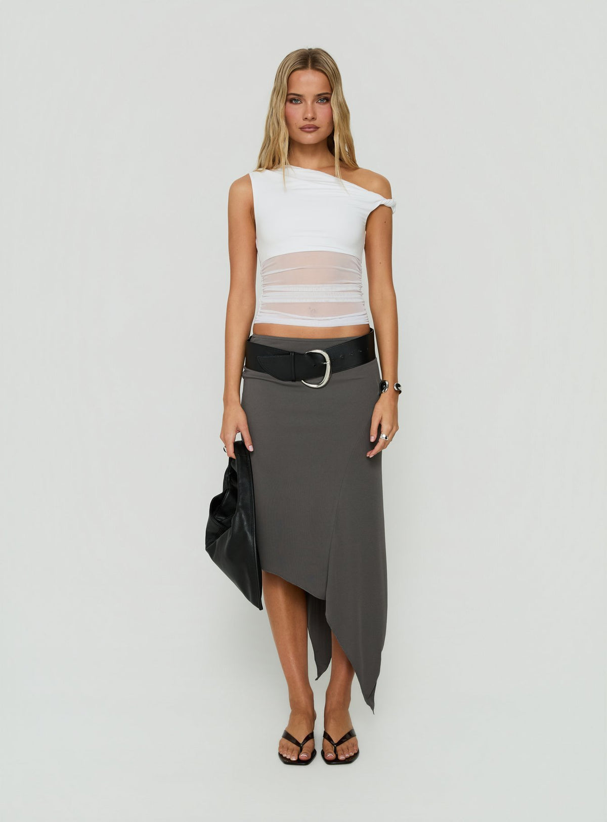 Showcasing the Aviza Asymmetrical Midi Skirt Grey in womens-skirts with fitted silhouette front view of model wearing Princess Polly