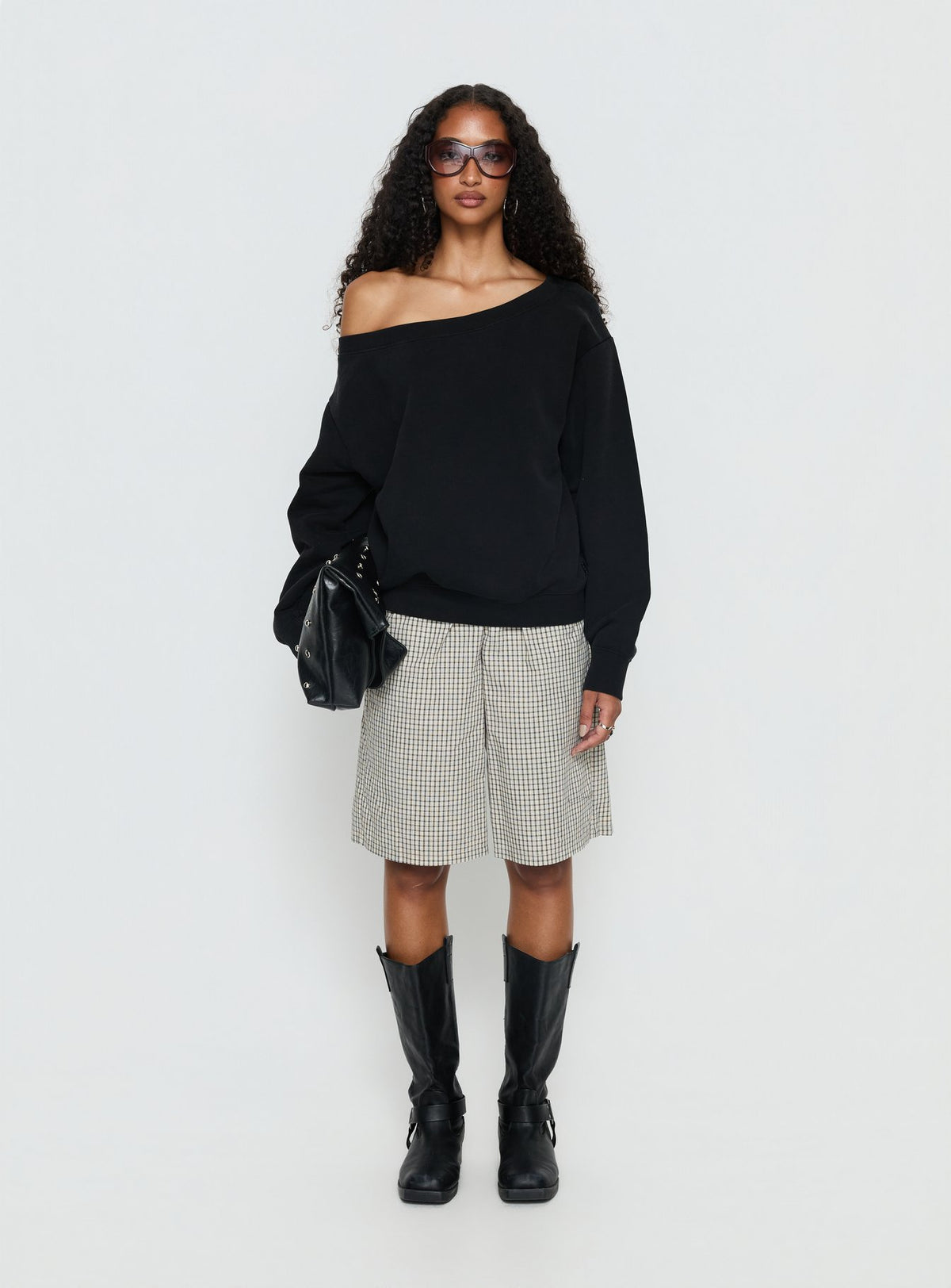 side view of model wearing Princess Polly Wellness Off the Shoulder Jumper Washed Black Longline Jumpers Jumpers 