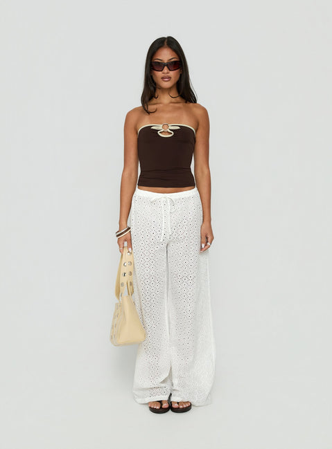 Showcasing the Lindora Drawstring Wide Leg Pants White Broderie in womens-regular-pants with mid-rise waist front view of model wearing Princess Polly