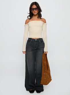 side view of model wearing Princess Polly Dusky Long Sleeve Top Cream Full Sleeves straight 
