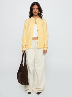 side view of model wearing Princess Polly Arica Button Up Knit Cardigan Lemon Longline Jumpers Jumpers 