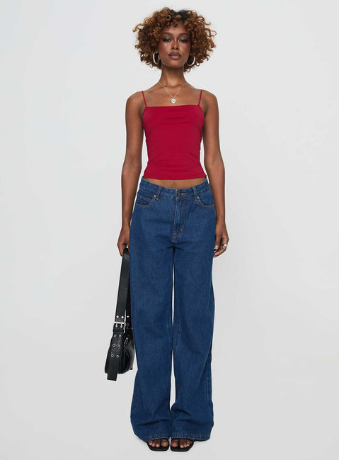 side view of model wearing Princess Polly Elissa Top Red Sleeveless Square Neck 
