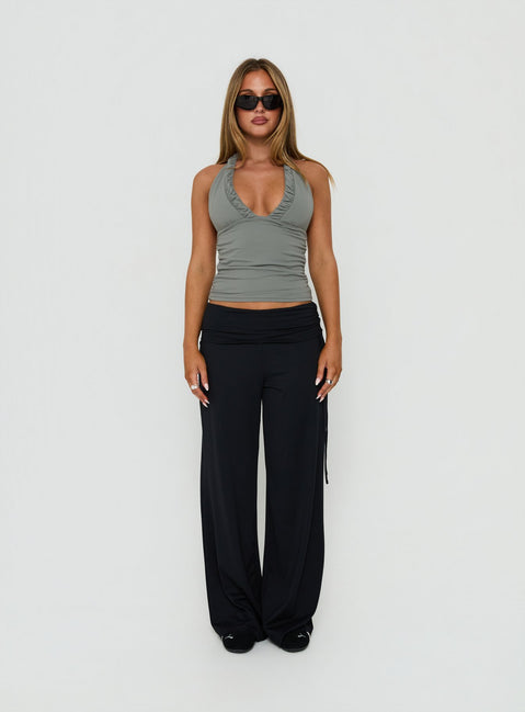 Showcasing the Daily Define Ruched Tie Side Pants Black Petite in womens regular pants with high-rise front view of model wearing