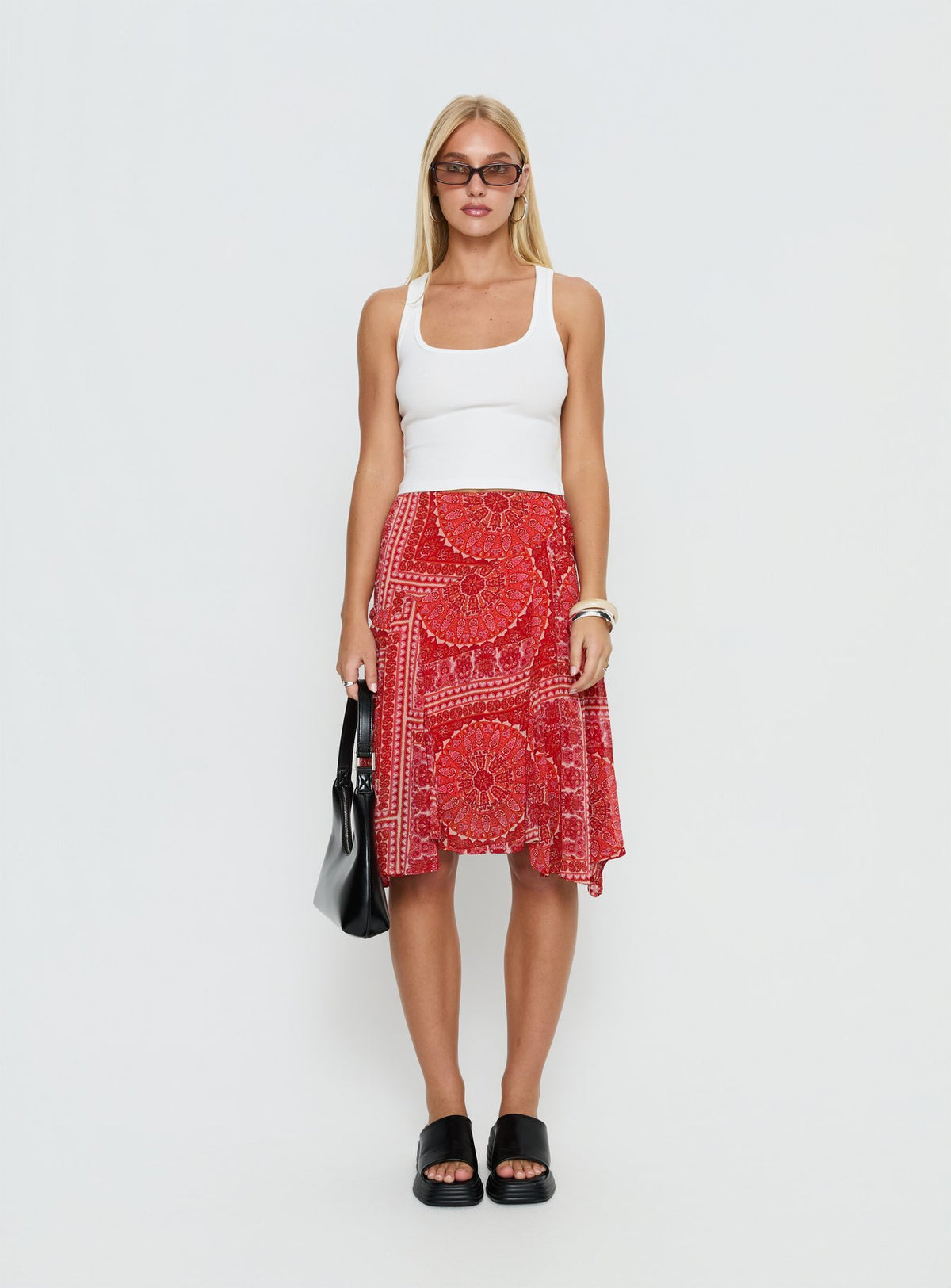   front view of model wearing Princess Polly Raenah Asymmetrical Midi Skirt Red Paisley Skirts 