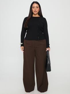 side view of model wearing Princess Polly Khane Low Rise Wide Leg Pant Brown Pinstripe Curve Low Rise Pants Pants 