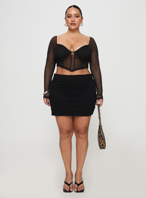   front view of model wearing Princess Polly Karley Low Waist Mini Skirt Black Curve Mini Skirts Skirts 