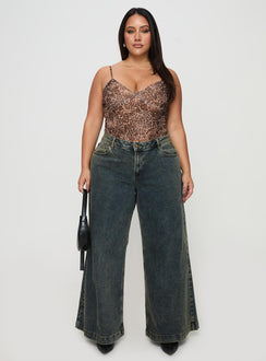 front view of model wearing Princess Polly Ziggie Low Rise Baggy Jeans Antique Wash Curve High Rise Jeans Jeans 