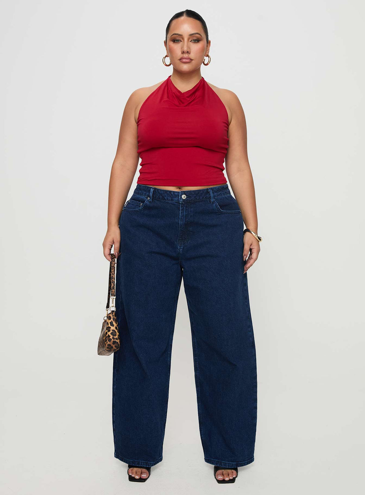 front view of model wearing Princess Polly Britta Mid Rise Tapered Leg Jeans Dark Wash Curve High Rise Jeans Jeans 