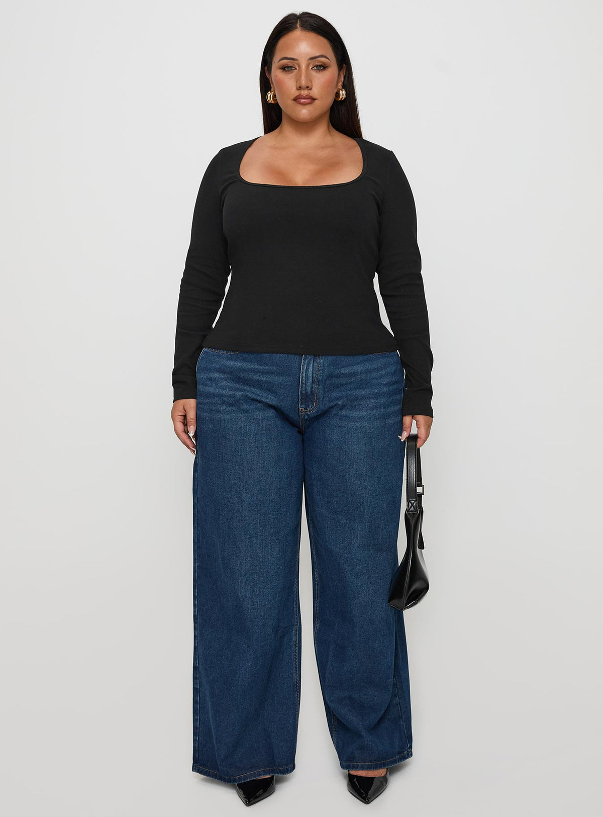 side view of model wearing Princess Polly Baseline Long Sleeve Top Black Curve Full Sleeves Square Neck 