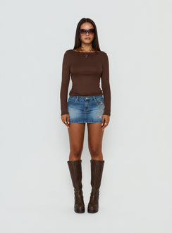 Featuring the Flatline Embroidered Denim Mini Skirt Mid Wash in womens-skirts with mini length front view of model wearing