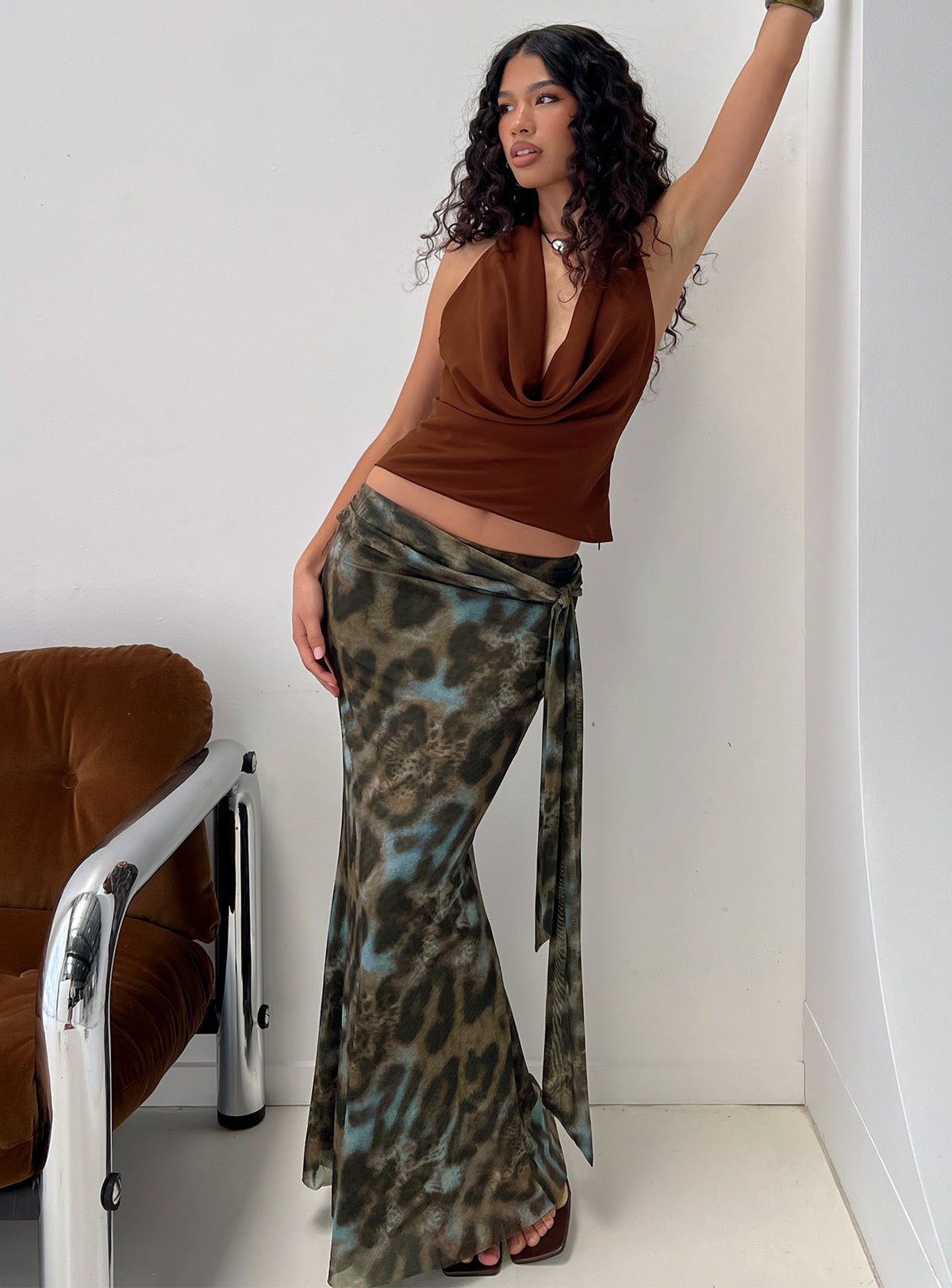   side view of model wearing Princess Polly Caviar Tie Maxi Skirt Leopard Skirts 