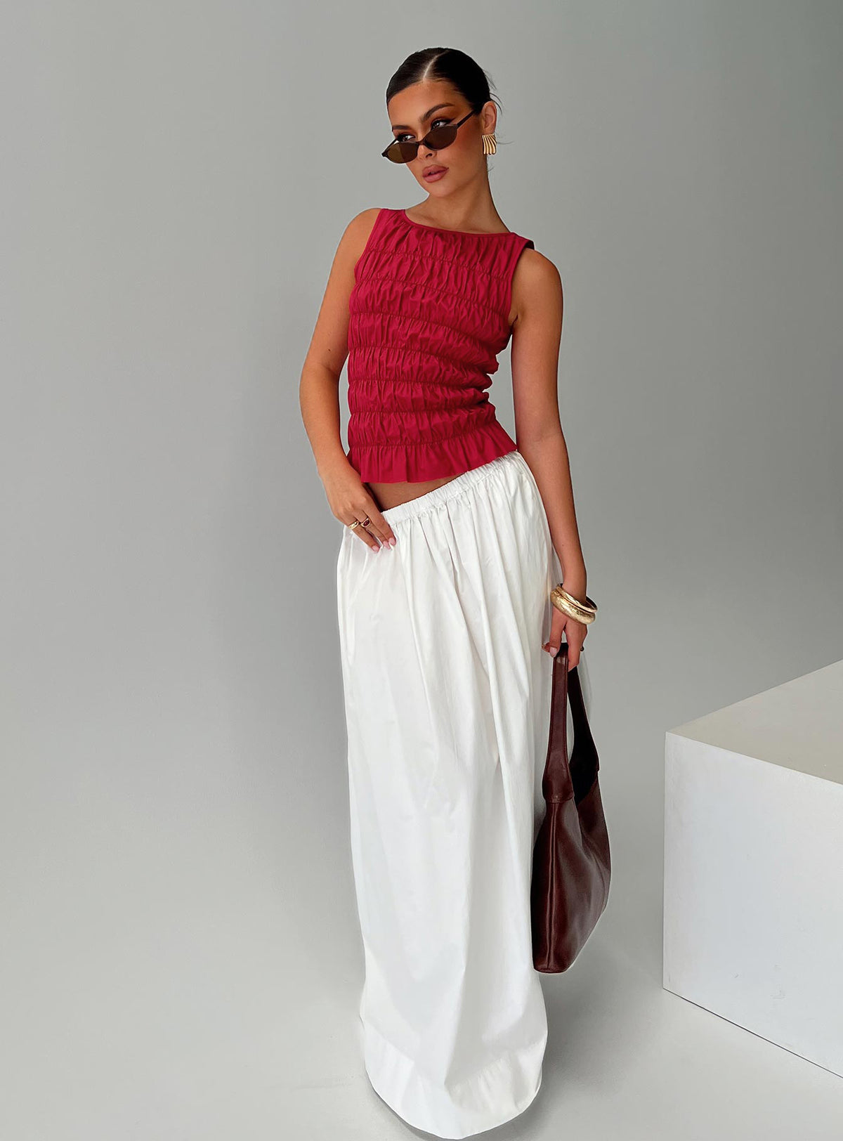   side view of model wearing Princess Polly Felipa Maxi Skirt White Maxi Skirts Skirts 