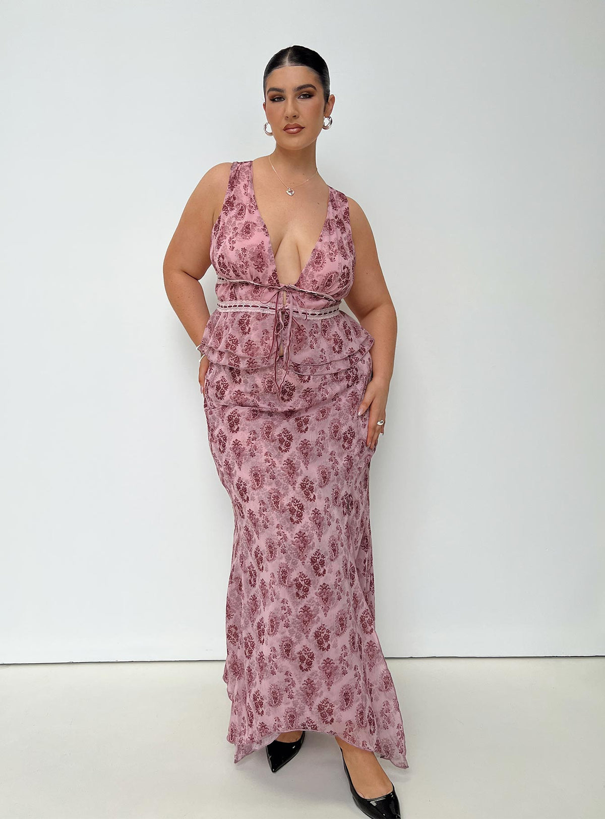 back view of model wearing Princess Polly Nikolise Top Purple Curve Sleeveless Plunger 