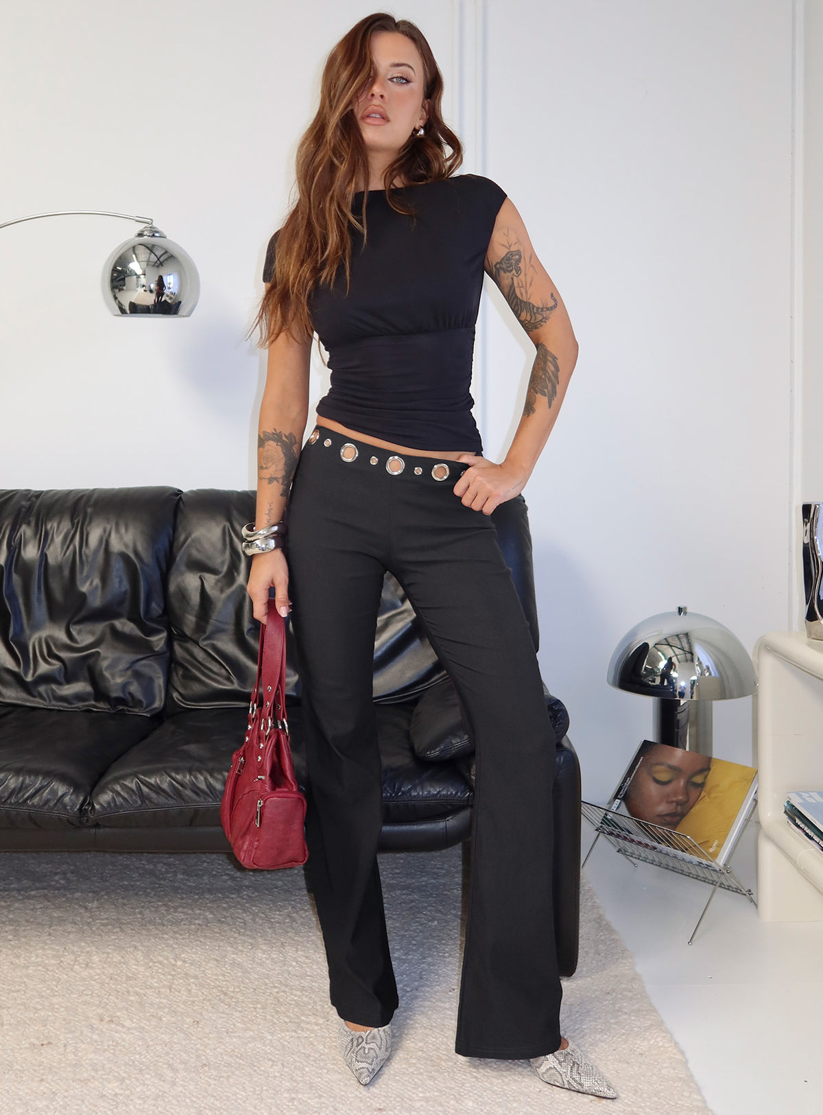 side view of model wearing Princess Polly True Grit Eyelet Flare Pants Grey Mid Rise Pants Pants 