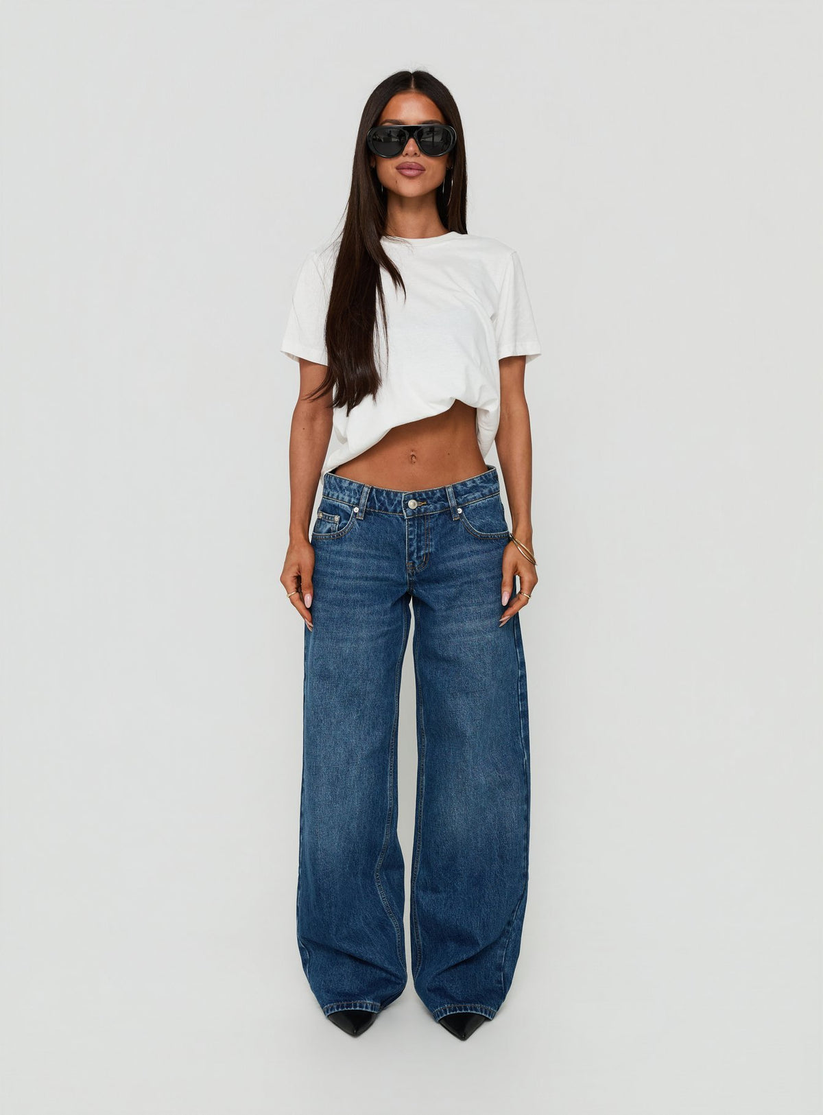Featuring the Ellanor Low Rise Straight Leg Jeans Vintage Dark Blue in womens-jeans with low-rise waist front view of model wearing Princess Polly