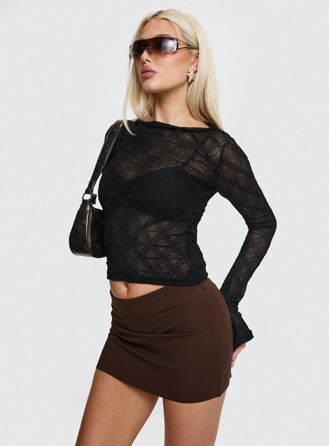   side view of model wearing Princess Polly Karley Low Waist Mini Skirt Chocolate Petite Mini Skirts Skirts 
