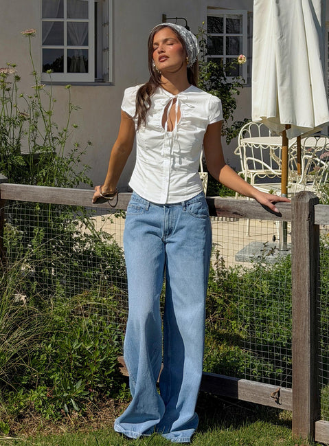 Highlighting the Ramos Low Rise Denim Jeans Bright Blue Wash Tall womens-jeans with low-rise waist product