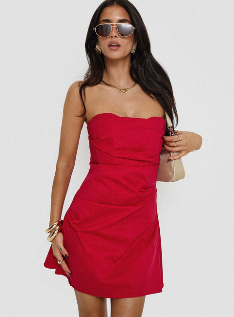 side view of model wearing Princess Polly Bradwell Strapless Mini Dress Red Sweetheart Neckline 