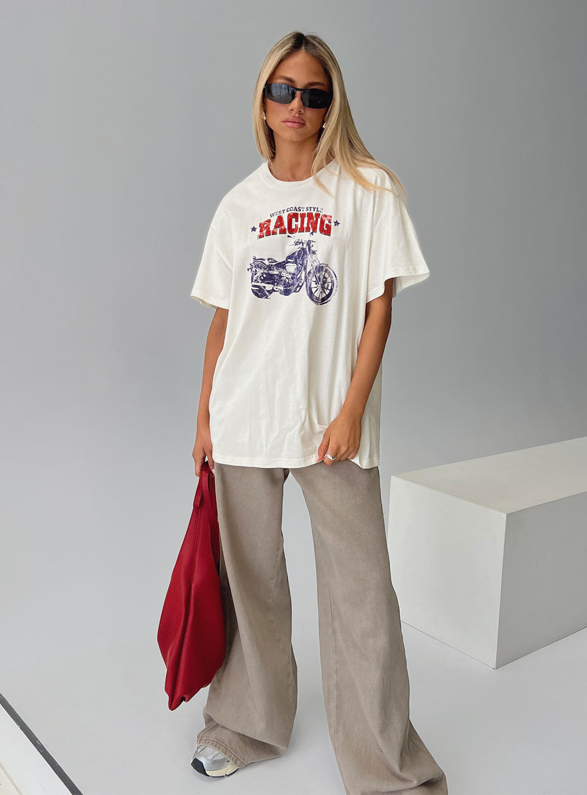 back view of model wearing Princess Polly West Coast Style Oversized Top White Half Sleeves Crew Neck 