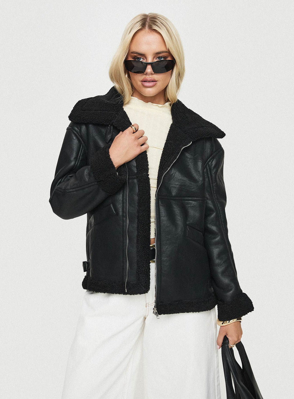 Shearling jacket Faux leather, oversized collar, exposed zip fastening, twin pockets Non-stretch material, shearling lining