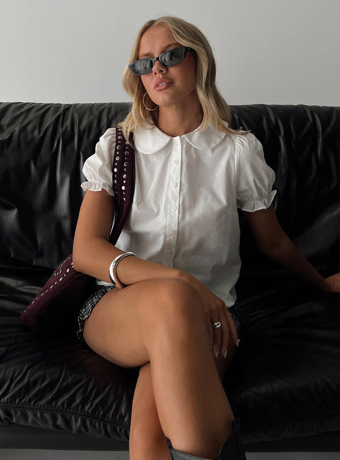 front view of model wearing Princess Polly Neverland Blouse Top White Short Sleeves Crew Neck 