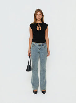 Showcasing the Bethany Low Rise Bootleg Jeans Ice Wash in womens-jeans with low-rise front view of model wearing