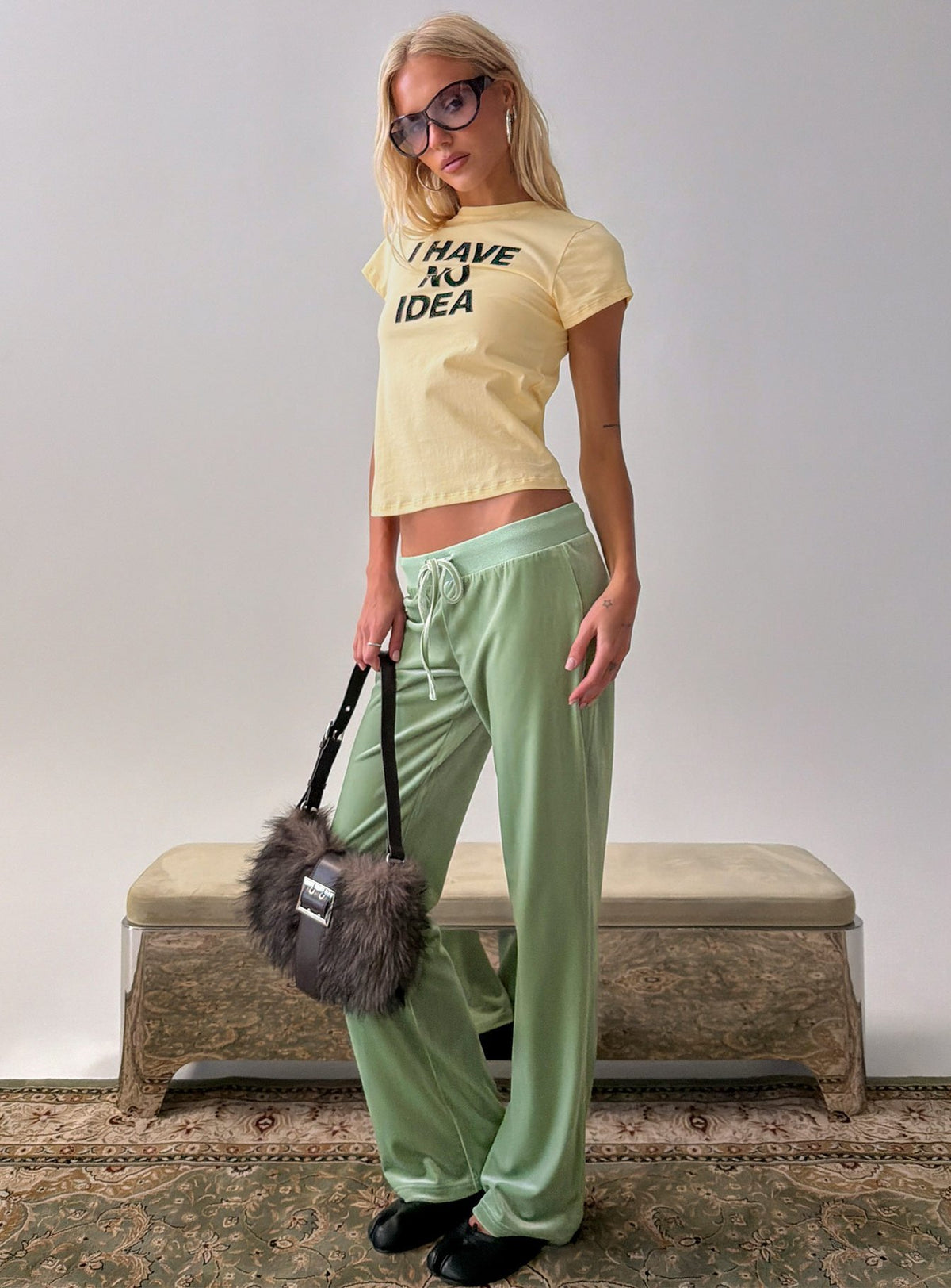 Crafted from Alba Track Pant Sage womens-regular-pants with mid-rise side view of model wearing Princess Polly