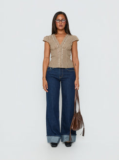 front view of model wearing Princess Polly Darla Low Rise Straight Leg Cuff Jean Dark Blue Wash Low Rise Jeans Jeans 