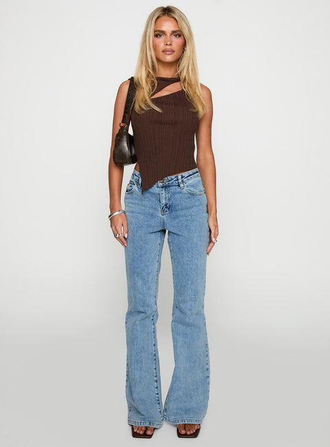 side view of model wearing Princess Polly Magic Mirror Mid Rise Bootleg Jeans Ice Wash Tall Mid Rise Jeans 