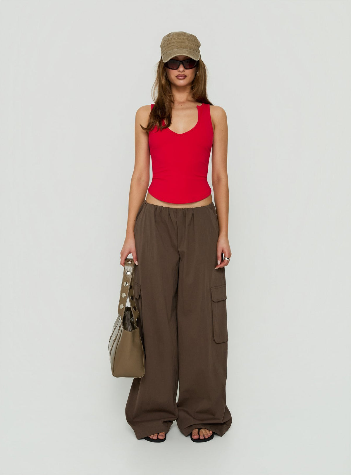 Elevated styling of Lunea Concealed Waistband Cargo Pants Brown womens-regular-pants featuring mid-rise product detail