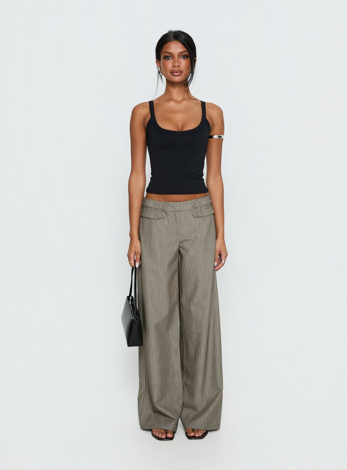 side view of model wearing Princess Polly Jette Tailored Buckle Pant Taupe Pinstripe Mid Rise Pants Pants 