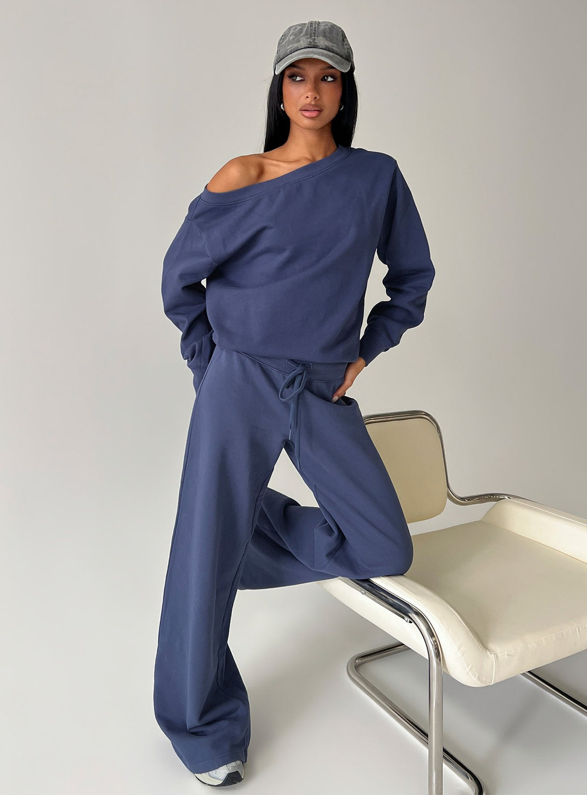 front view of model wearing Princess Polly Wellness Off the Shoulder Jumper Navy Jumpers 