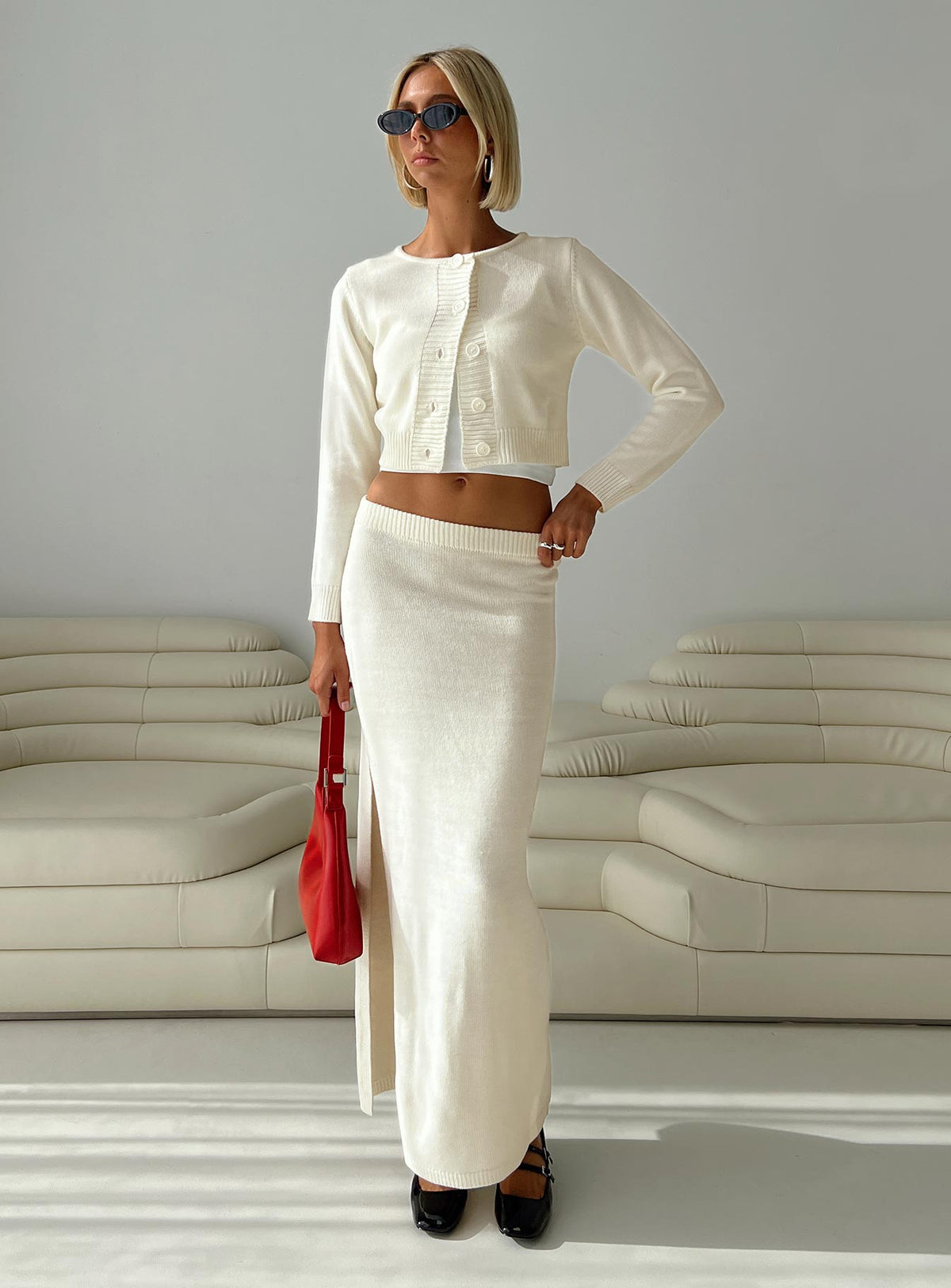 side view of model wearing Princess Polly Collase Knit Sweater Cream cropped Jumpers 