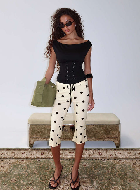 front view of model wearing Princess Polly Samaira Capri Pant Cream Polka Dot Mid Rise Pants Pants 
