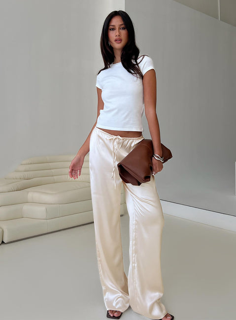 back view of model wearing Princess Polly Soulstar Satin Pants Champagne Low Rise Pants 