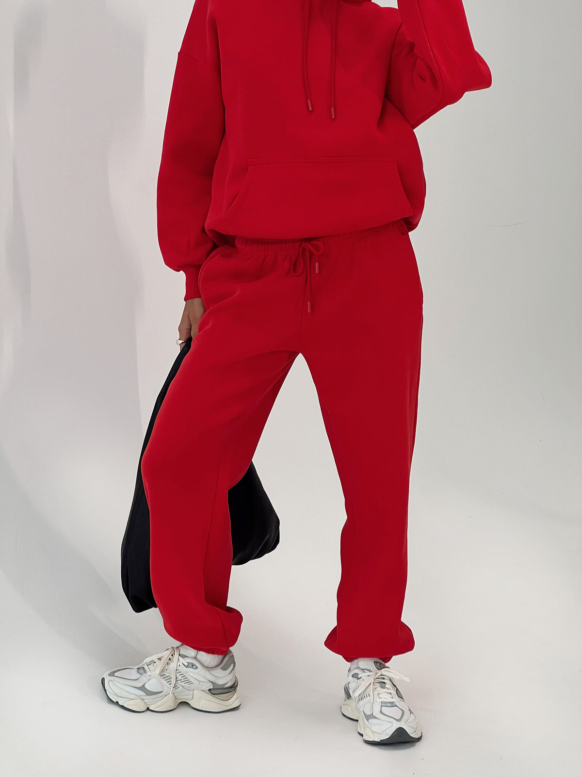 front view of model wearing Princess Polly Dream Fleece Ankle Cuff Sweatpants Red High Rise Pants Pants 