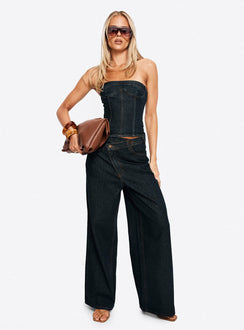 front view of model wearing Princess Polly Blue Crush Low Rise Wide Leg Jeans Indigo Mid Rise Jeans Jeans 