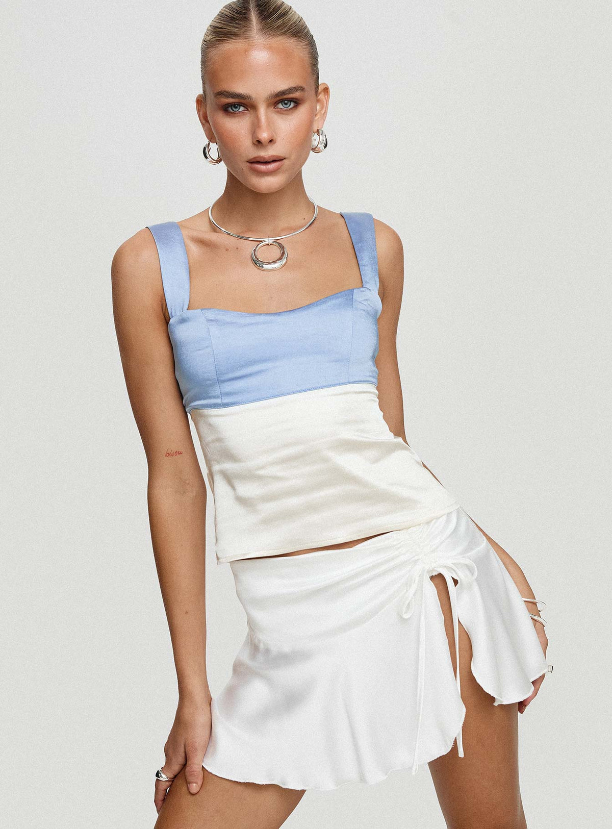 front view of model wearing Princess Polly Chantell Top Blue / White Sleeveless Sweetheart 