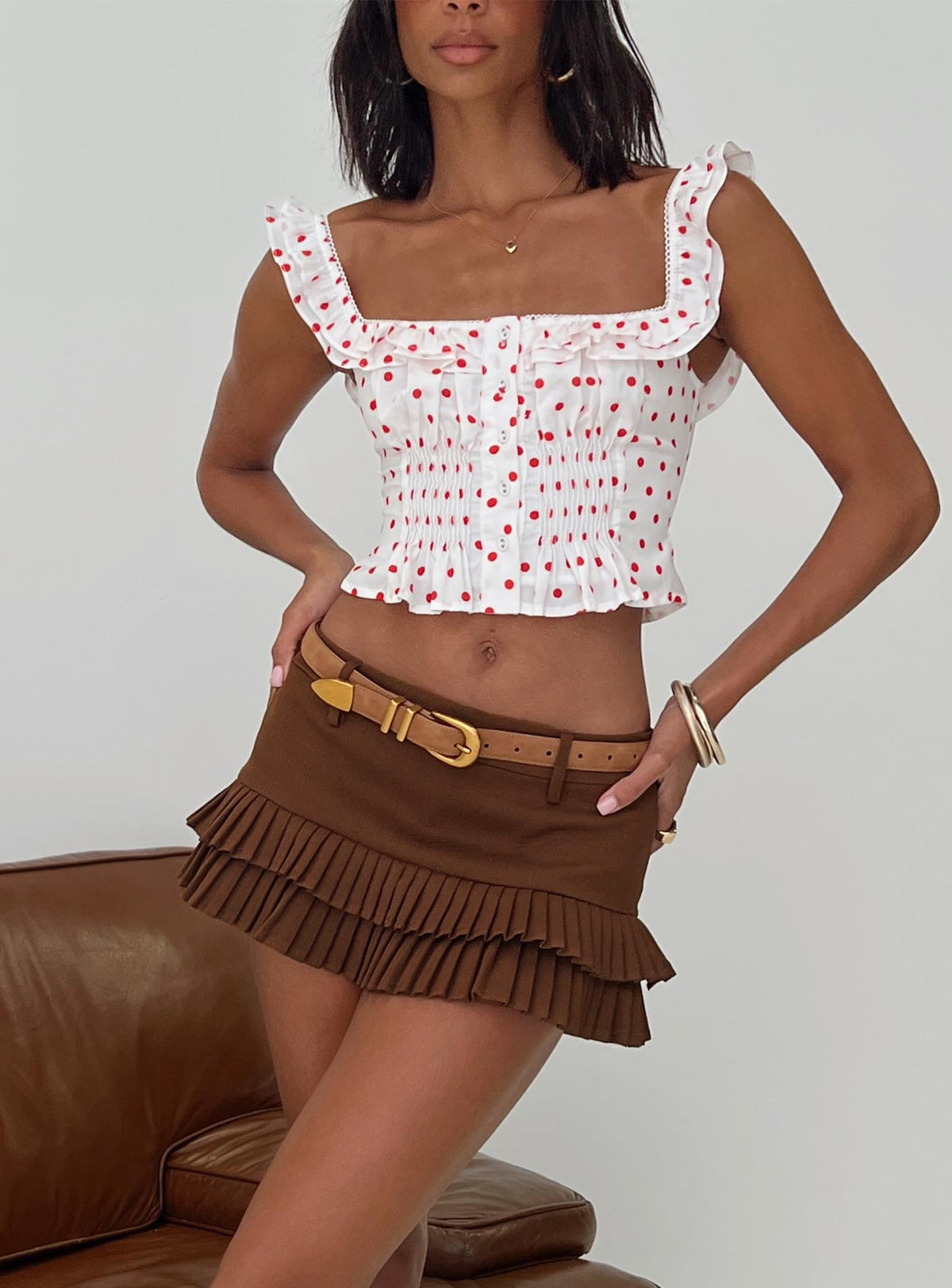 side view of model wearing Princess Polly Isadoria Frill Top White / Red Polka Sleeveless Square Neck 