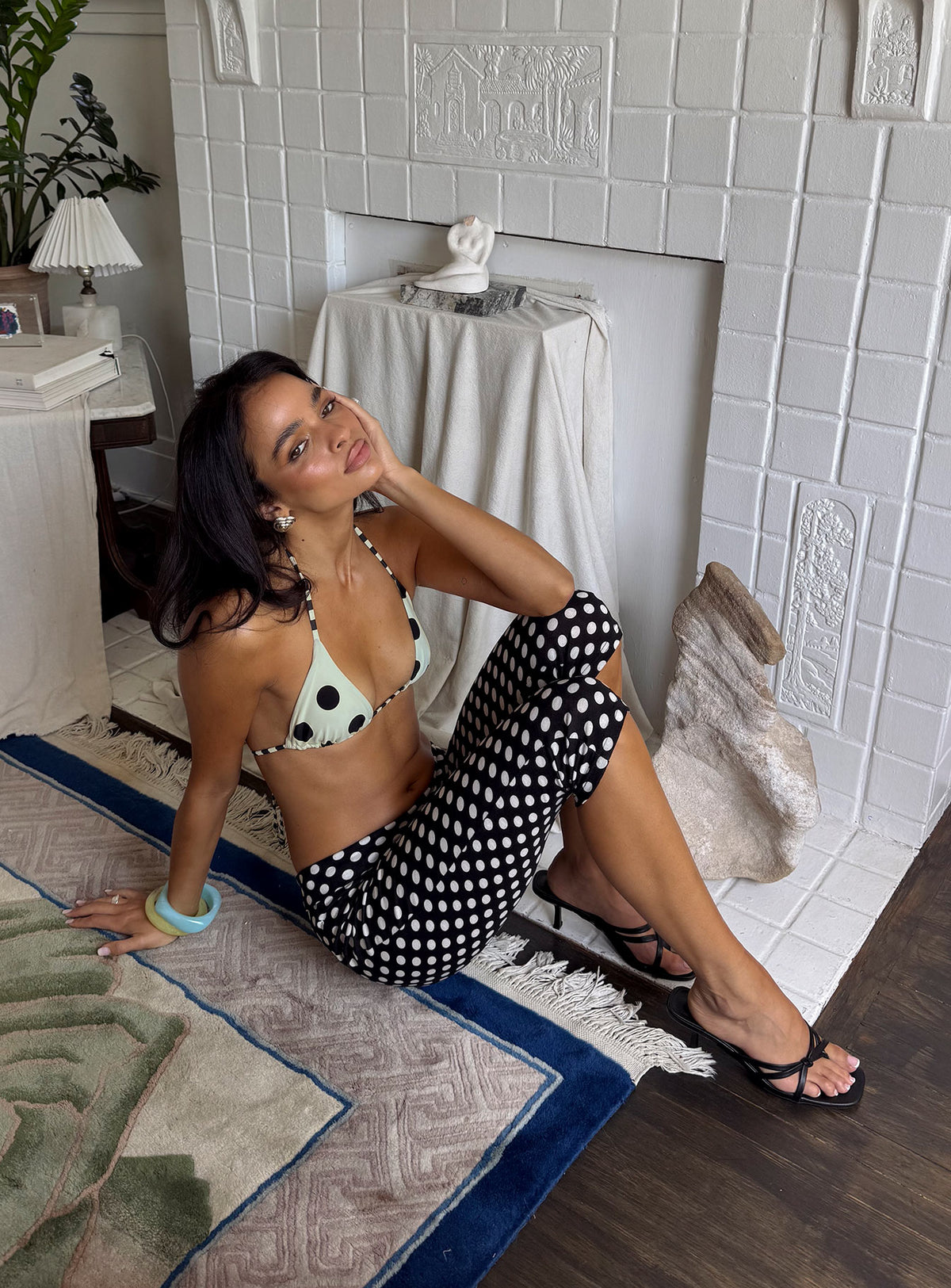 side view of model wearing Princess Polly Isadonna Capri Pants Black Polka Dot Mid Rise Pants Pants 