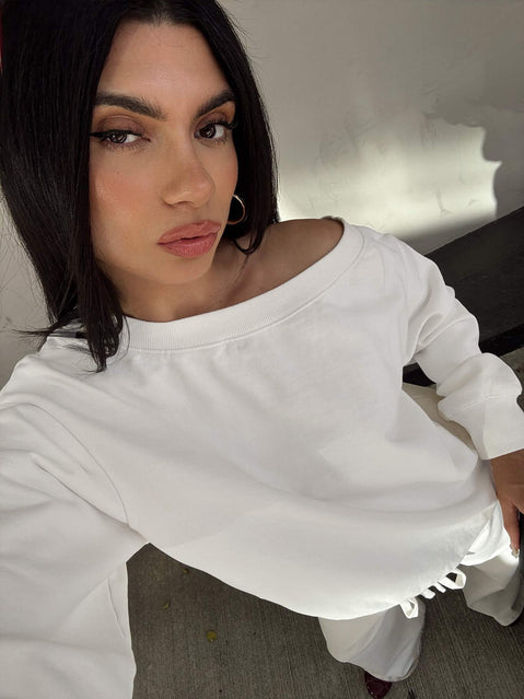 back view of model wearing Princess Polly Wellness Off The Shoulder Jumper Washed White Jumpers 