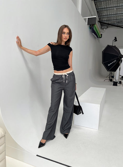 side view of model wearing Princess Polly Seraphic Pants Charcoal Stripe High Rise Pants Pants 