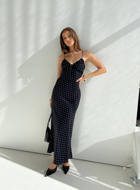 front view of model wearing Princess Polly Emily Maxi Dress Black Polka Dot V-Neck 